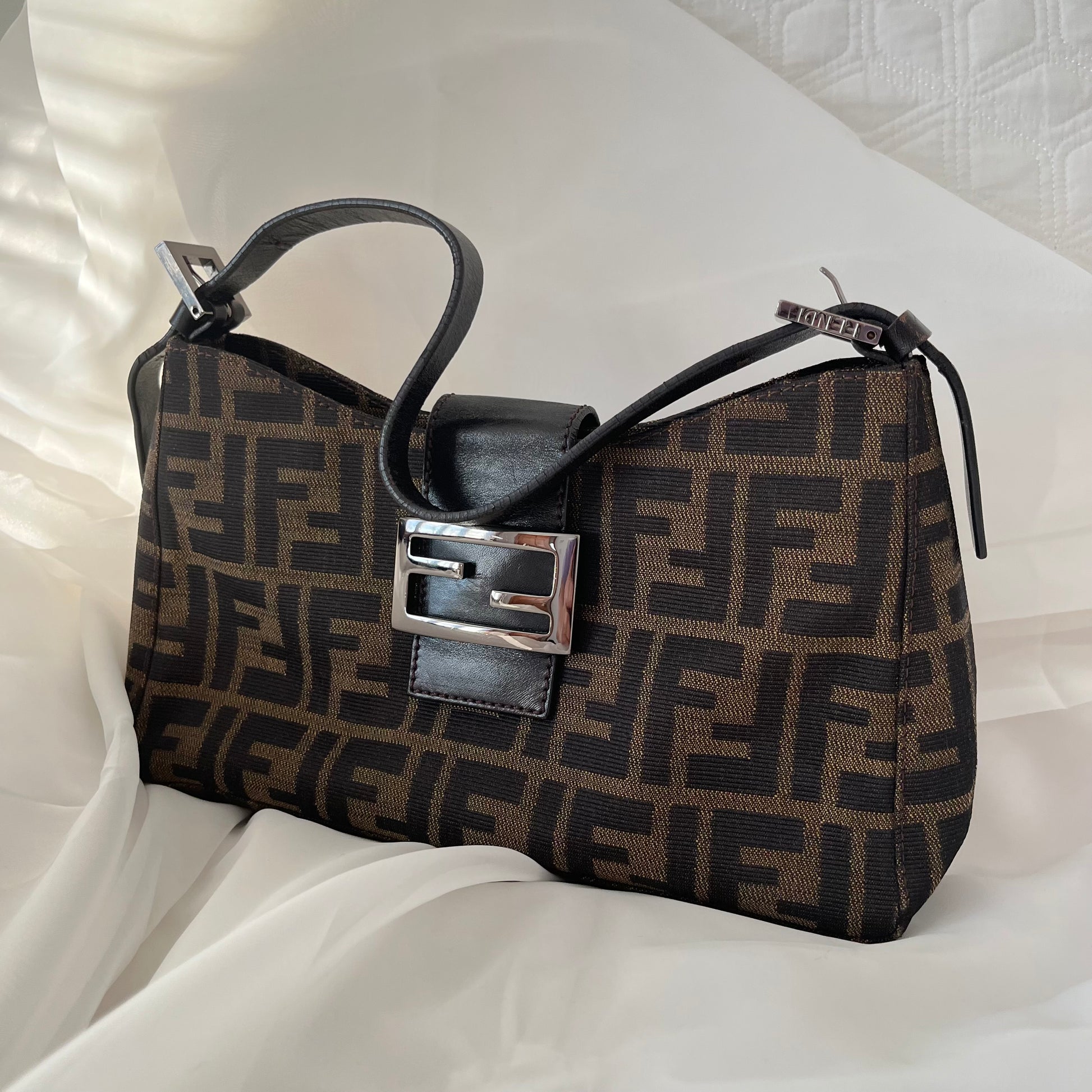 fendi tobacco zucca canvas mini pochette bag Just In: Preloved cosmetic in brown with leather trim Compact, practical, and unmistakably Fendi perfect for everyday essentials or as a chic pouch inside your Fendi Handbags Fendi Zucca Mini